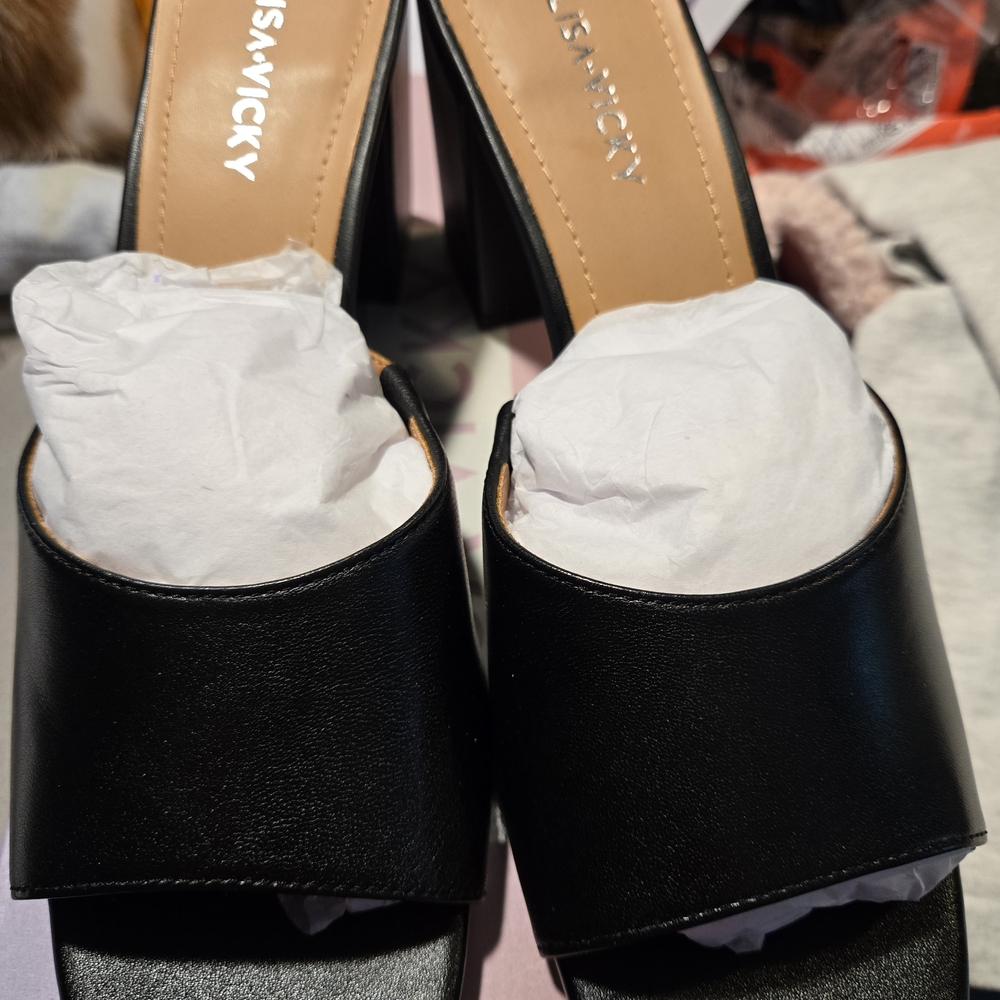 Elegant Black Mules by